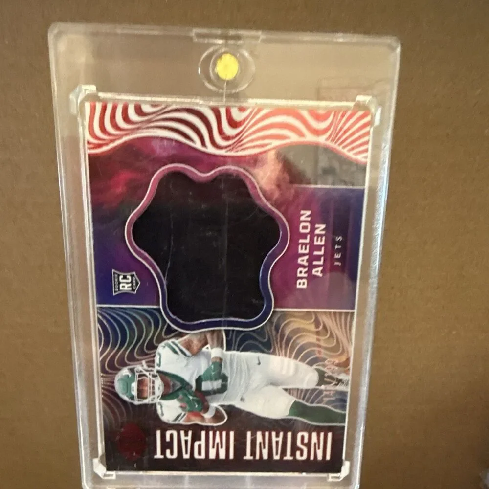 2024 Panini Illusions Braelon Allen Jets Instant Impact II-BAN Red /199 RC MEM